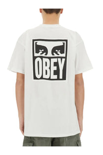 White cotton obey men’s eyes icon t-shirt with bold black and white stylized eyes graphic and obey block letters