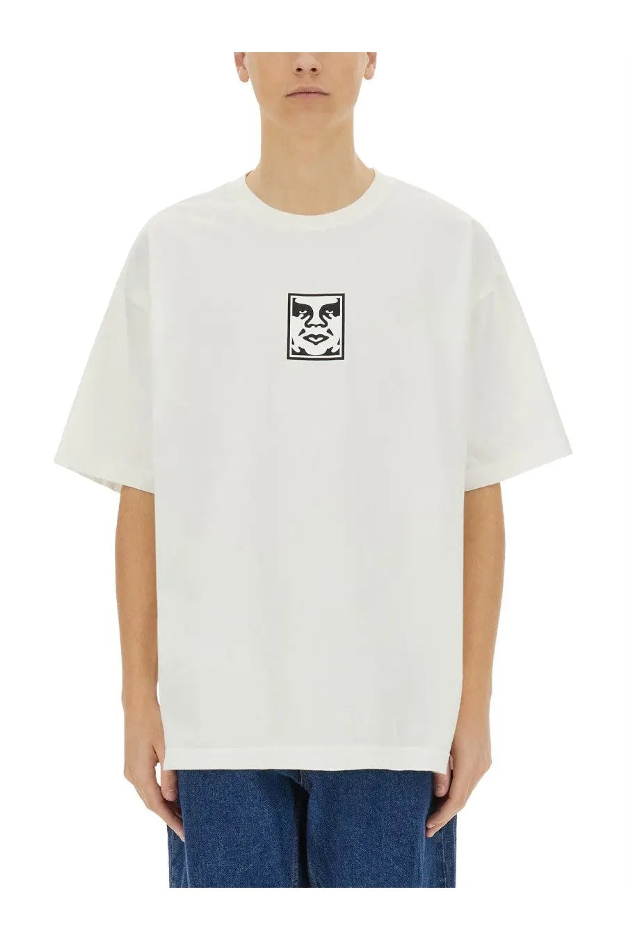 White oversized cotton t-shirt featuring a black square logo with an iconic face design from Obey men’s collection