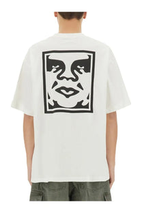 Obey men’s white short-sleeved t-shirt with bold black abstract face graphic in a square frame on front