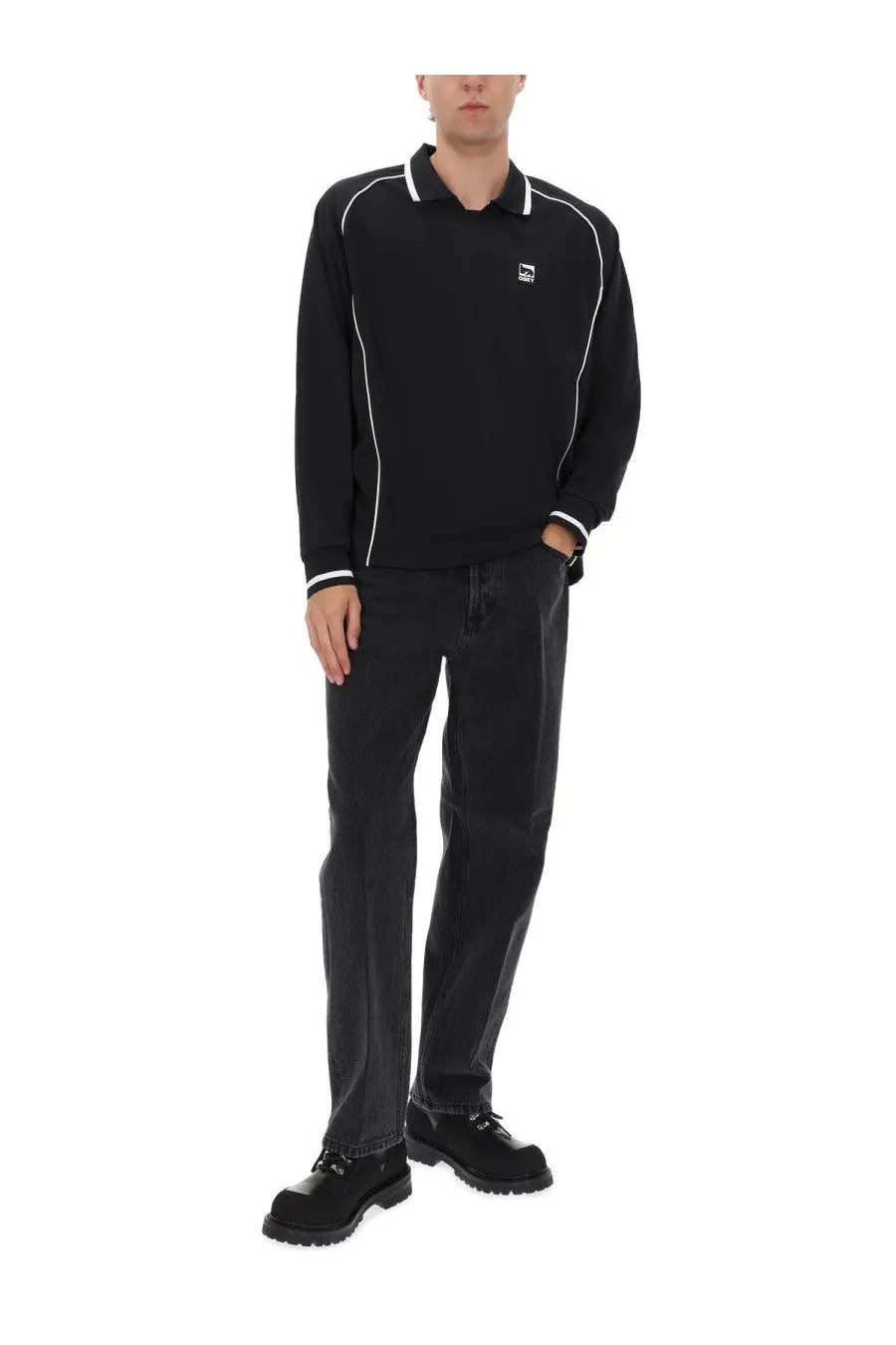 Obey men’s black long-sleeved polo shirt with white piping and chest logo, paired with hardwork black pants