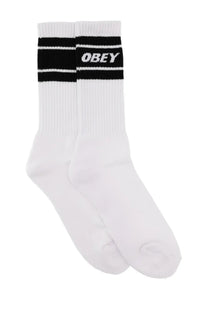 White ribbed crew socks with black and white striped cuff featuring the obey logo in bold white lettering