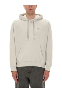 Obey men’s sweatshirt beige cream-colored obey hoodie with subtle red logo on chest and matching drawstrings