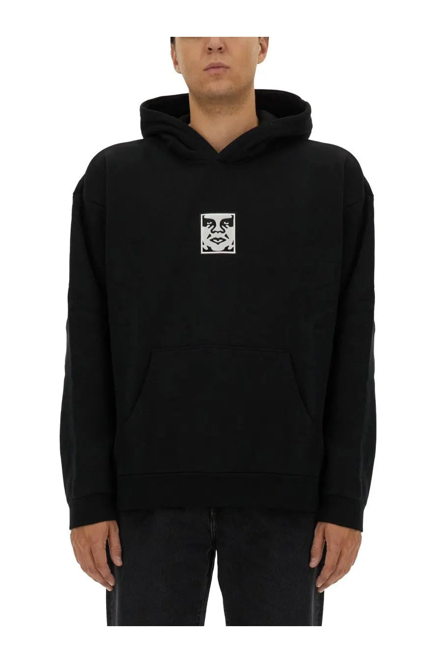 Obey men’s black hoodie with white eye and mouth graphic on chest in comfortable sweatshirt material