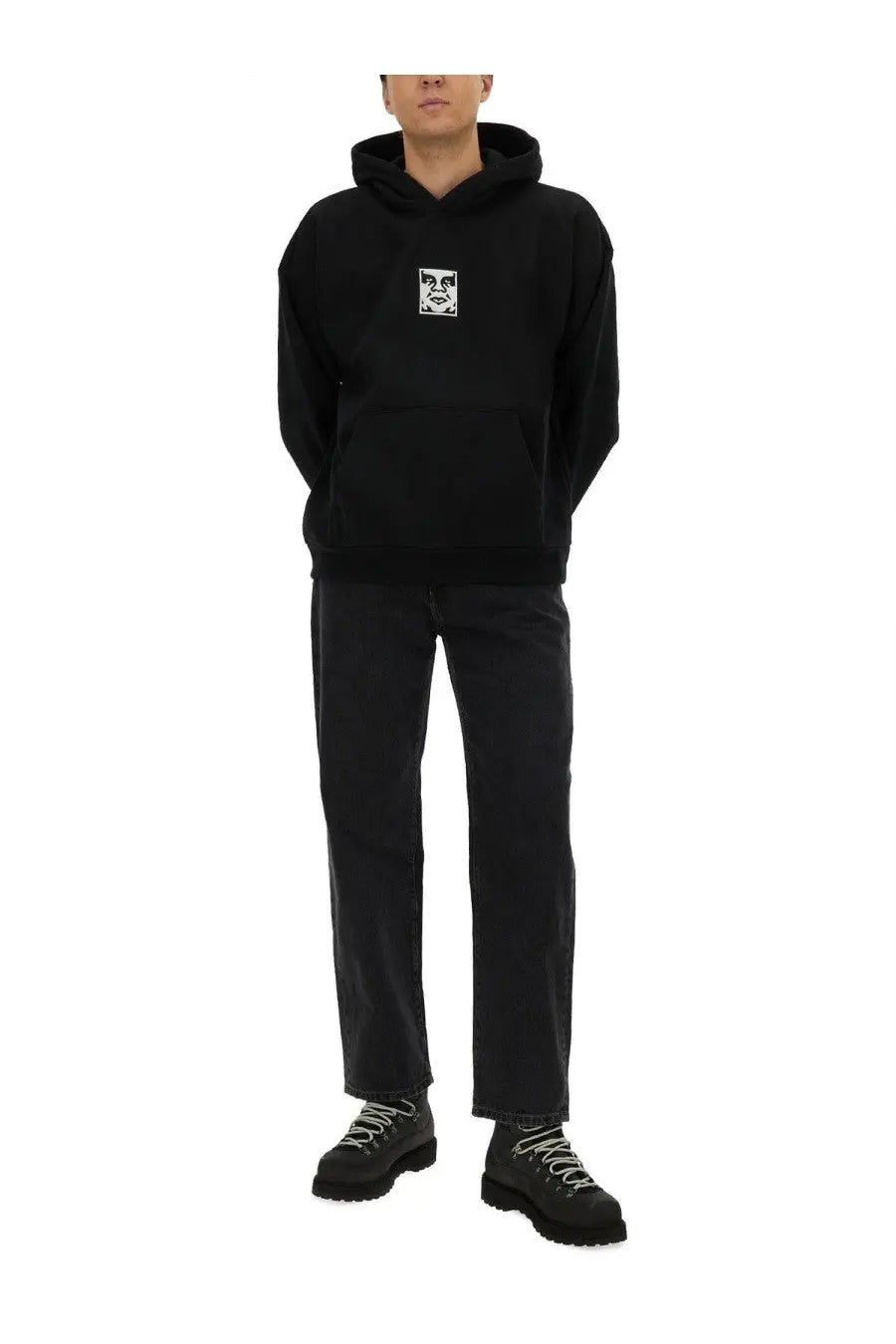 Obey men’s black sweatshirt hoodie with a white graphic patch on the chest made from soft cotton material