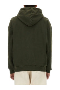 Obey men’s olive green hooded sweatshirt with relaxed fit and ribbed cuffs perfect for casual wear