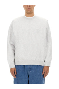 Obey men’s heather gray crewneck sweatshirt with subtle embroidered logo on left chest in soft cotton blend