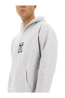 Obey men’s light gray heathered hoodie with black and white graphic logo on the chest in soft cotton material