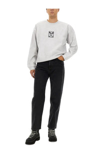 Obey men’s light gray long-sleeved sweatshirt with small black and white expressive face graphic on chest