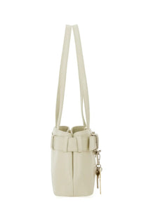 Cream-colored leather bucket bag with matching belt strap and silver hardware from Osoi Borsa Brocle mini white collection