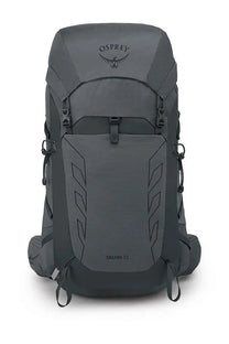 Dark gray osprey unisex talon 33 backpack with sleek durable design and subtle geometric front panel patterns