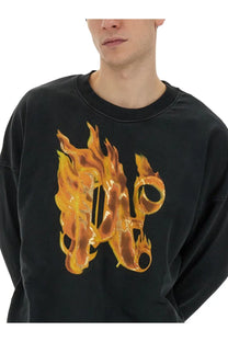 Black palm angels long-sleeved sweatshirt with bold orange and yellow flame monogram print for men