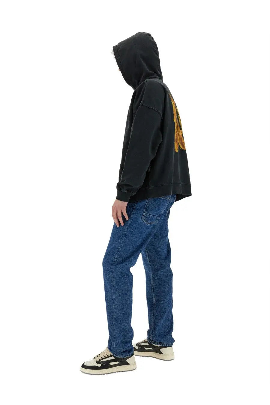 Black oversized hoodie with faded gold burning monogram print on the back by Palm Angels men’s sweatshirt