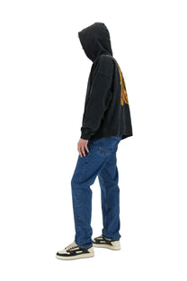 Black oversized hoodie with faded gold burning monogram print on the back by Palm Angels men’s sweatshirt