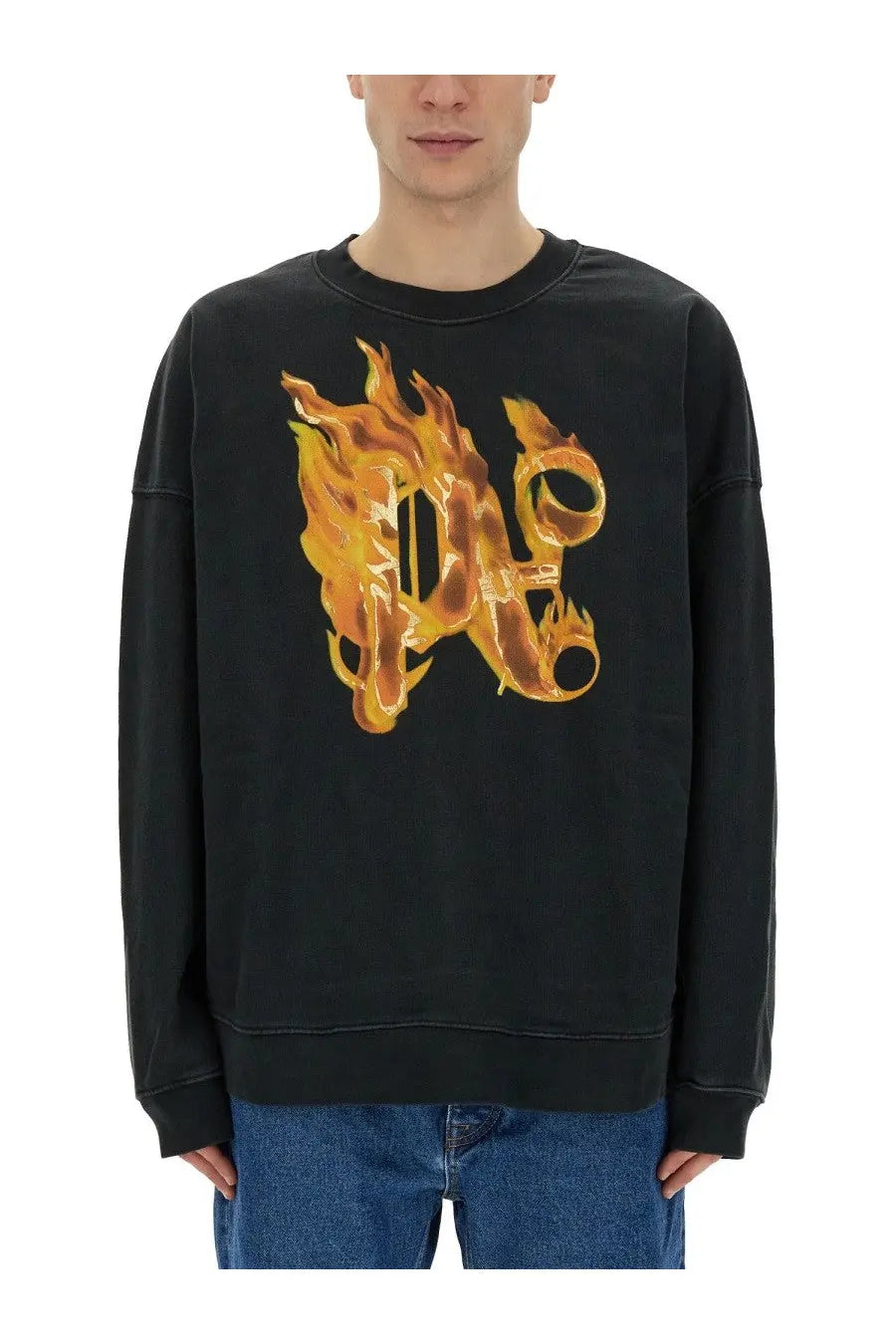 Black oversized Palm Angels men’s sweatshirt with bold flame-embossed d logo in golden-orange hues across the chest