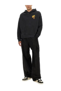 Black palm angels men’s hoodie with small embroidered palm tree logo on chest in soft cotton material