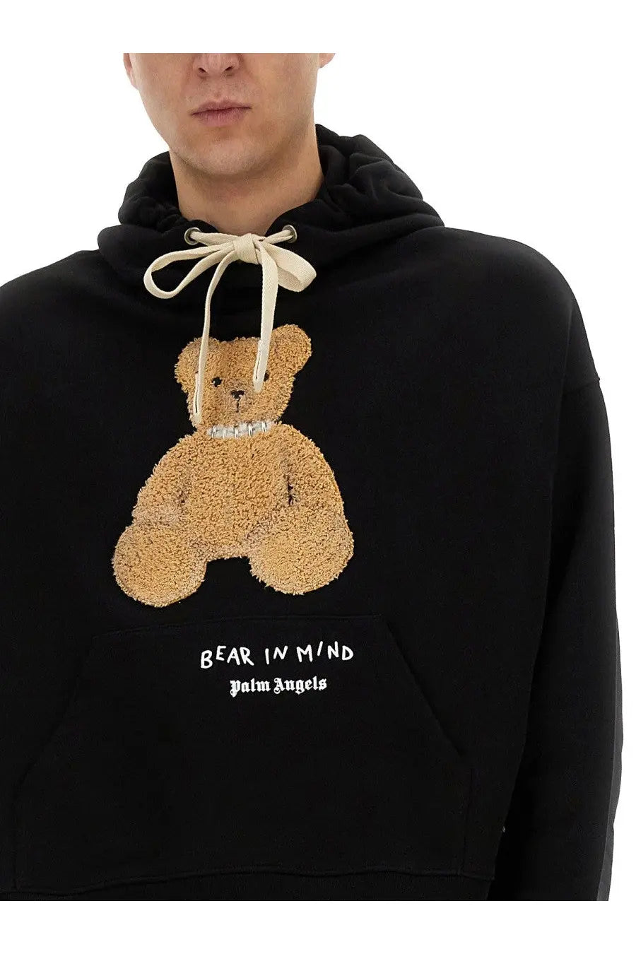 Palm Angels men’s black hoodie with tan textured teddy bear appliqué and pearl-like collar featuring bear in mind text