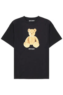Black palm angels men shirt featuring a tan embroidered teddy bear graphic with white lettering on cotton fabric