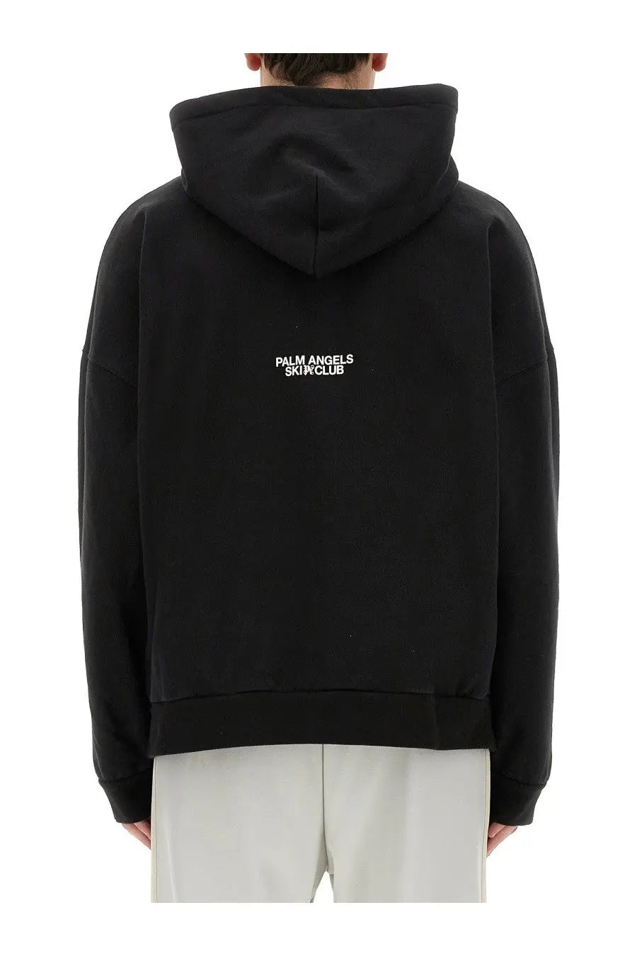 Back side of black palm angels men’s palm ski club sweatshirt with white embroidered branding on cotton fabric