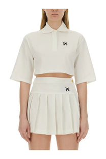 Palm Angels women’s cream-colored cropped polo shirt with short sleeves and small black embroidered chest logo