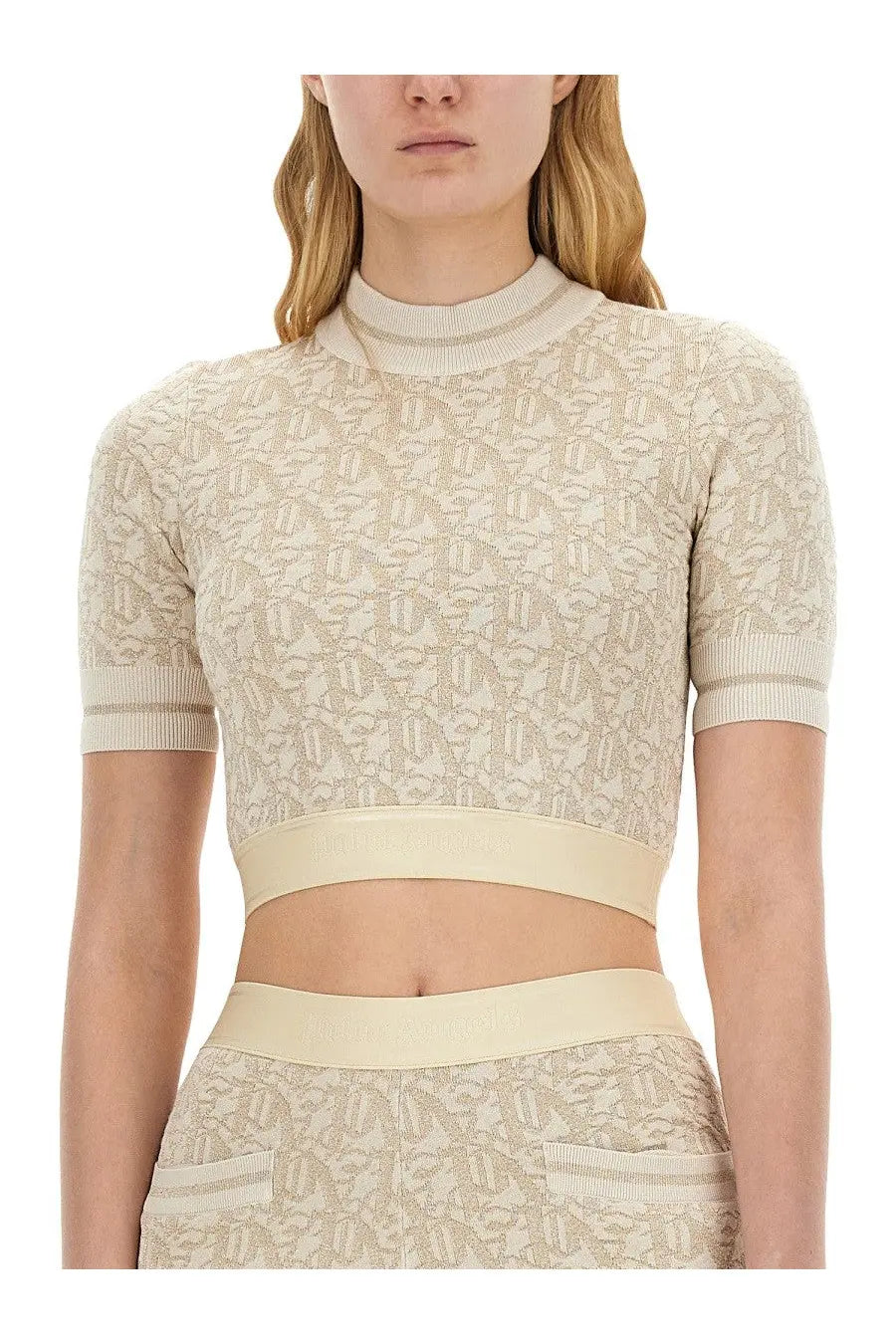 Beige cropped knit top with repeating monogram pattern and ribbed cuffs from Palm Angels women’s monogram jersey white collection