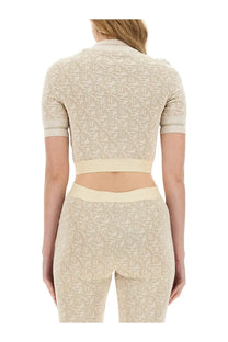 Beige cropped knit top with short sleeves and palm angels monogram pattern in jersey material for women