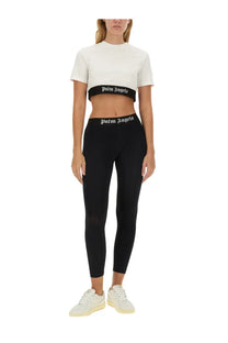 Black palm angels cropped top and leggings set with white logo trim in a palm angels women’s shirt white product