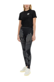 Black palm angels athletic leggings with subtle gray palm tree pattern and horizontal stripe detailing