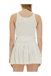 Cream-colored pleated skirt with matching white cropped tank top from palm angels womens tank top collection