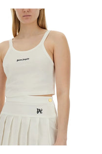 White cropped tank top for women featuring black palm angels embroidery on the chest and logo patch at the waistband