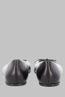 Paloma wool women’s ballerina napoli black leather ballet flats showing the back with a small bow detail