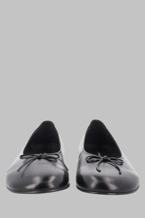 Paloma Wool women’s ballerina Napoli black patent leather flats with a small bow at the front