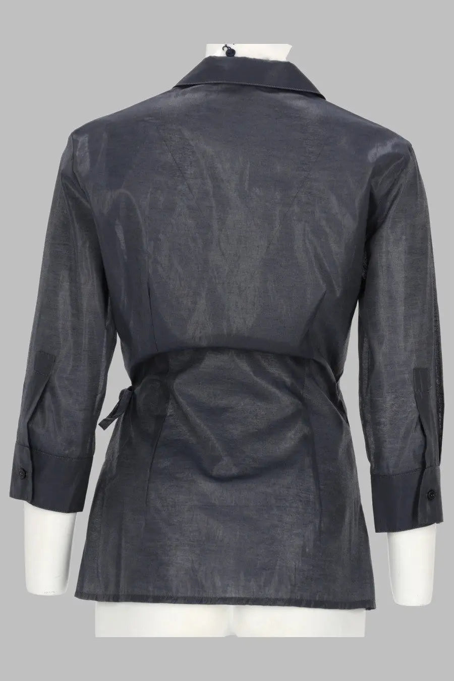 Black satin-like blazer with subtle sheen and three-quarter length sleeves from paloma wool women’s camicia wrap ricer blue collection
