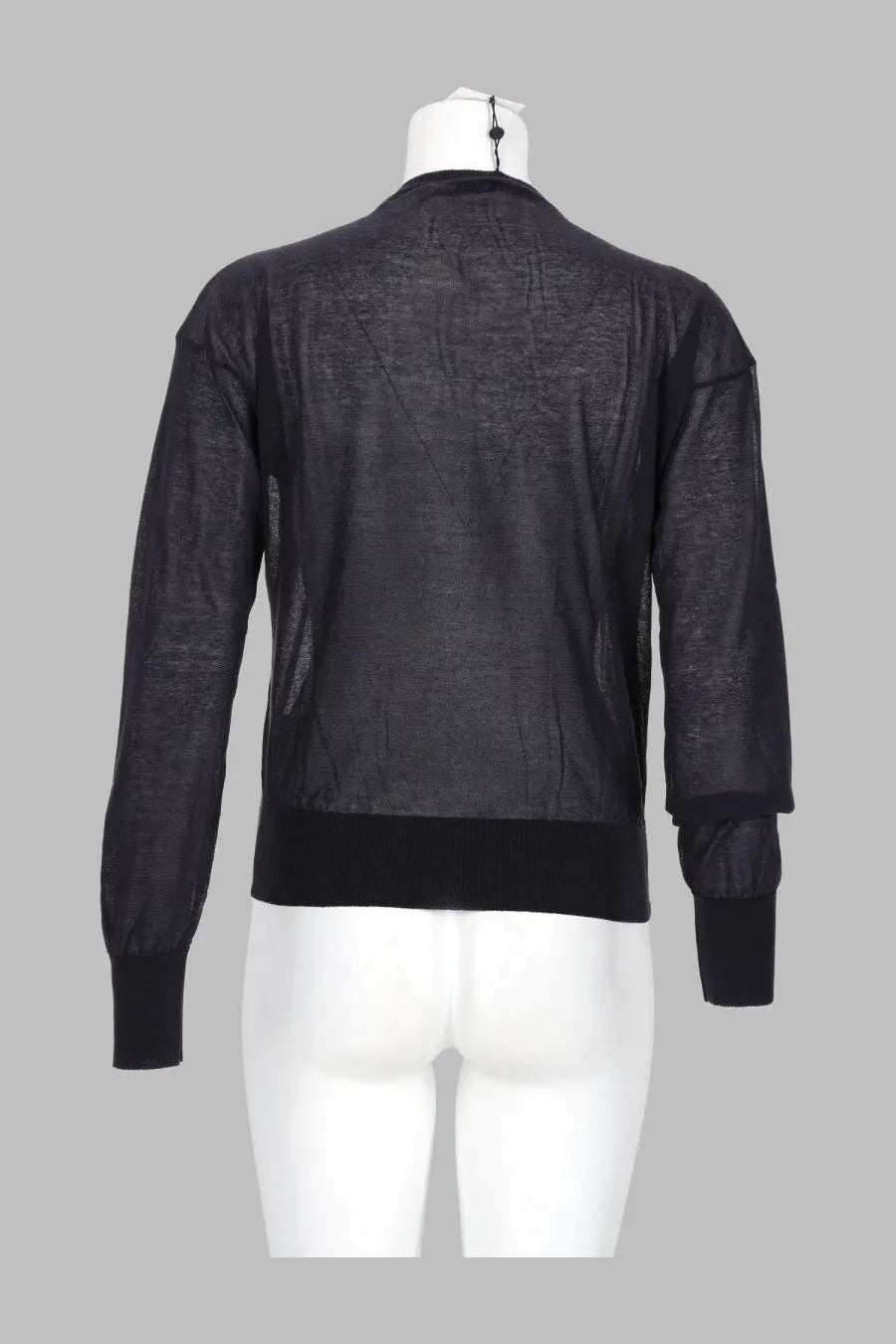 Black sheer mesh bomber jacket with ribbed cuffs and hem shown from the back in Paloma Wool women’s cardigan Paige Blue