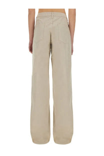 Beige wide-leg Paloma Wool Asia pants with minimalist design and subtle stitching details for women