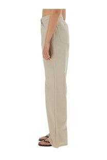 Beige wide-leg Paloma Wool women’s pants Asia with a straight cut and front pockets ideal for casual wear