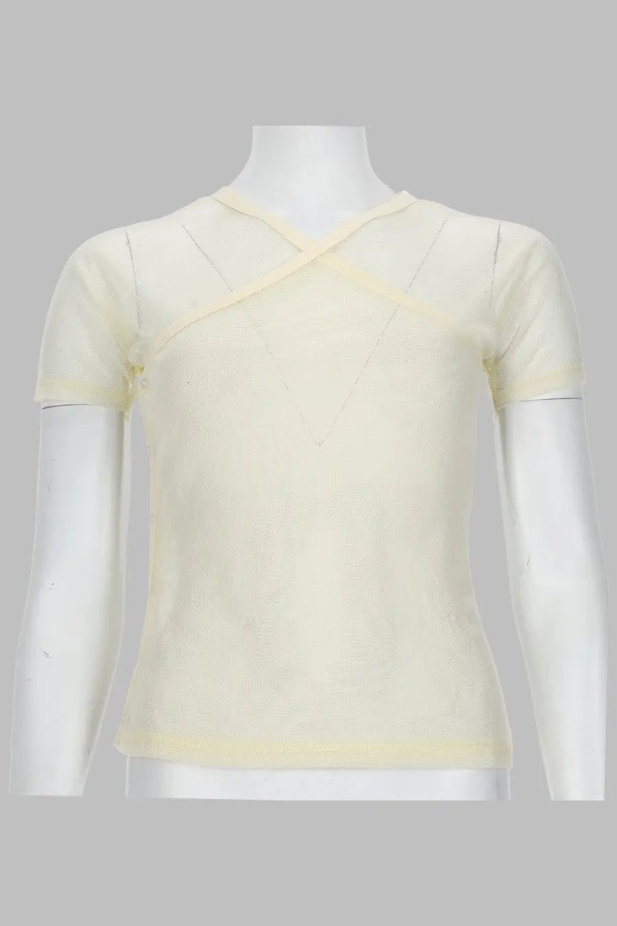 A cream-colored paloma wool women’s top olimipa in mesh white with short sleeves and a cross-over neckline