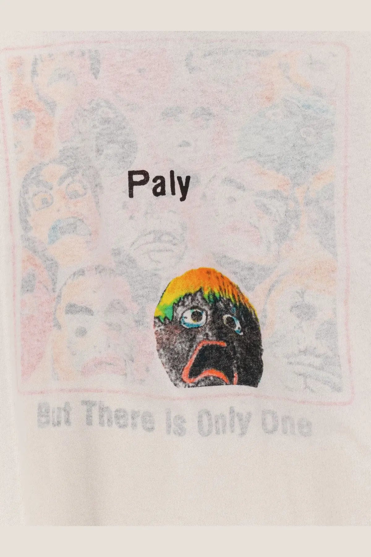 White cotton men’s t-shirt featuring a cartoon face with rainbow hair and paly text for anxiety relief