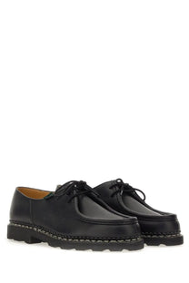 Paraboot men’s lace-up oxford shoes in black leather with textured rubber sole and visible stitching along edge