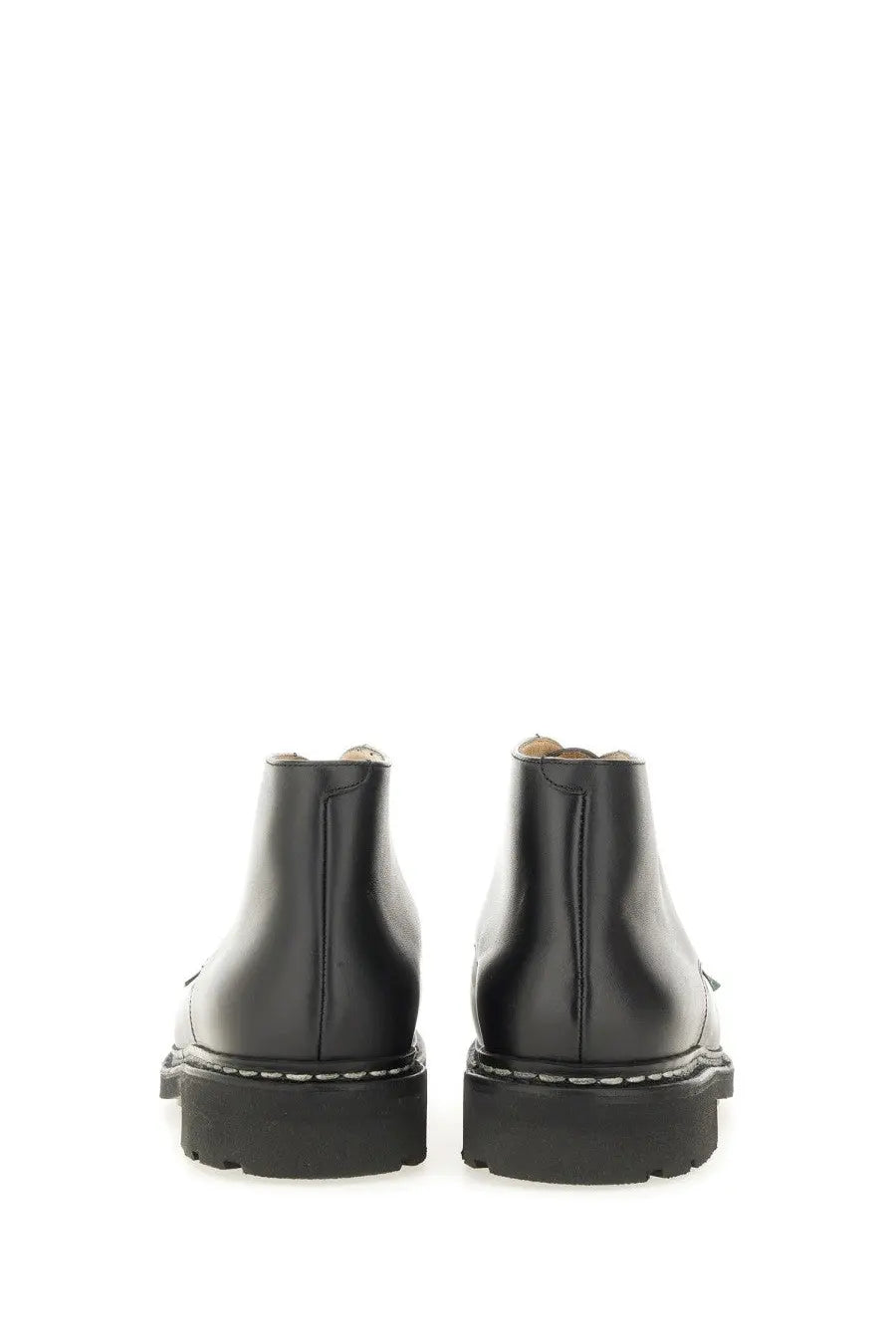 Paraboot men’s black leather ankle boots with chunky sole and contrasting white stitching for durable style
