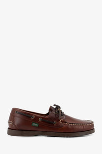 Paraboot men’s brown leather loafers with black laces and green brand tag in a boat shoe style