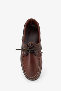 Paraboot men’s leather loafers brown featuring brown leather boat shoe design with white stitching and dark brown laces