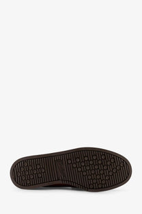 Brown rubber sole with textured tread and embossed paraboot logo on men’s leather loafers brown