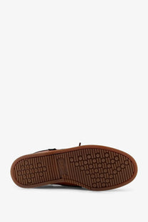 Brown rubber sole with textured tread and gotham branding on paraboot men’s leather loafers miel