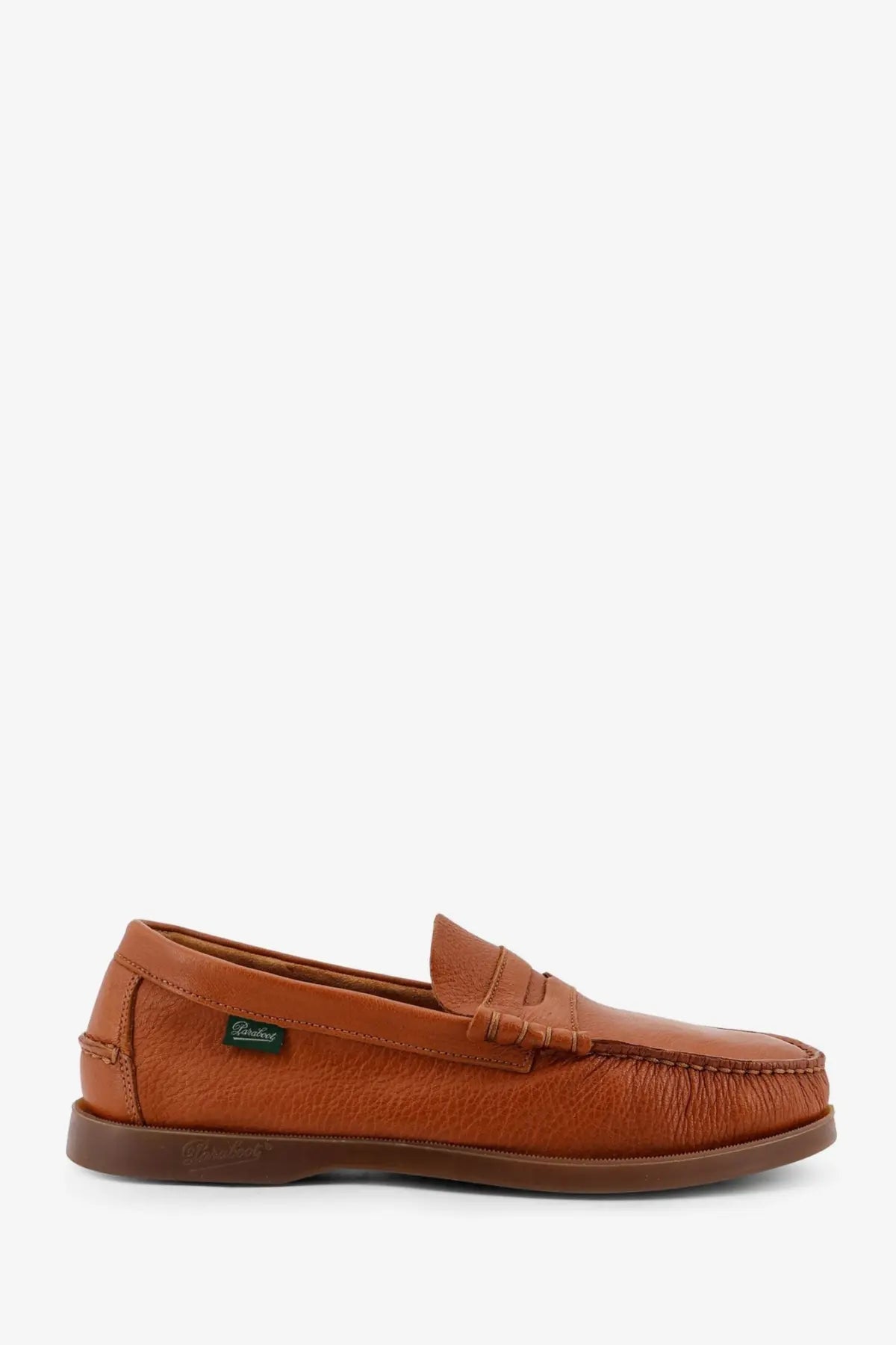 Tan leather moccasin with classic slip-on design and small green label on the side from paraboot men’s leather loafers miel