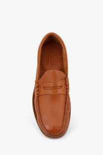 Paraboot men’s tan leather loafers with classic slip-on design and visible stitching details in miel color