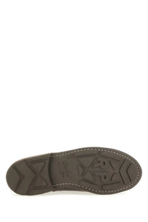 Dark brown rubber sole with textured tread and white stitching on the edge of paraboot men’s moccasin chambord brown