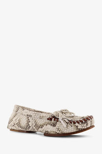 Beige snake-print leather moccasin with brown stitching and frayed bow detail from Paris Texas Women’s Indiana loafers white