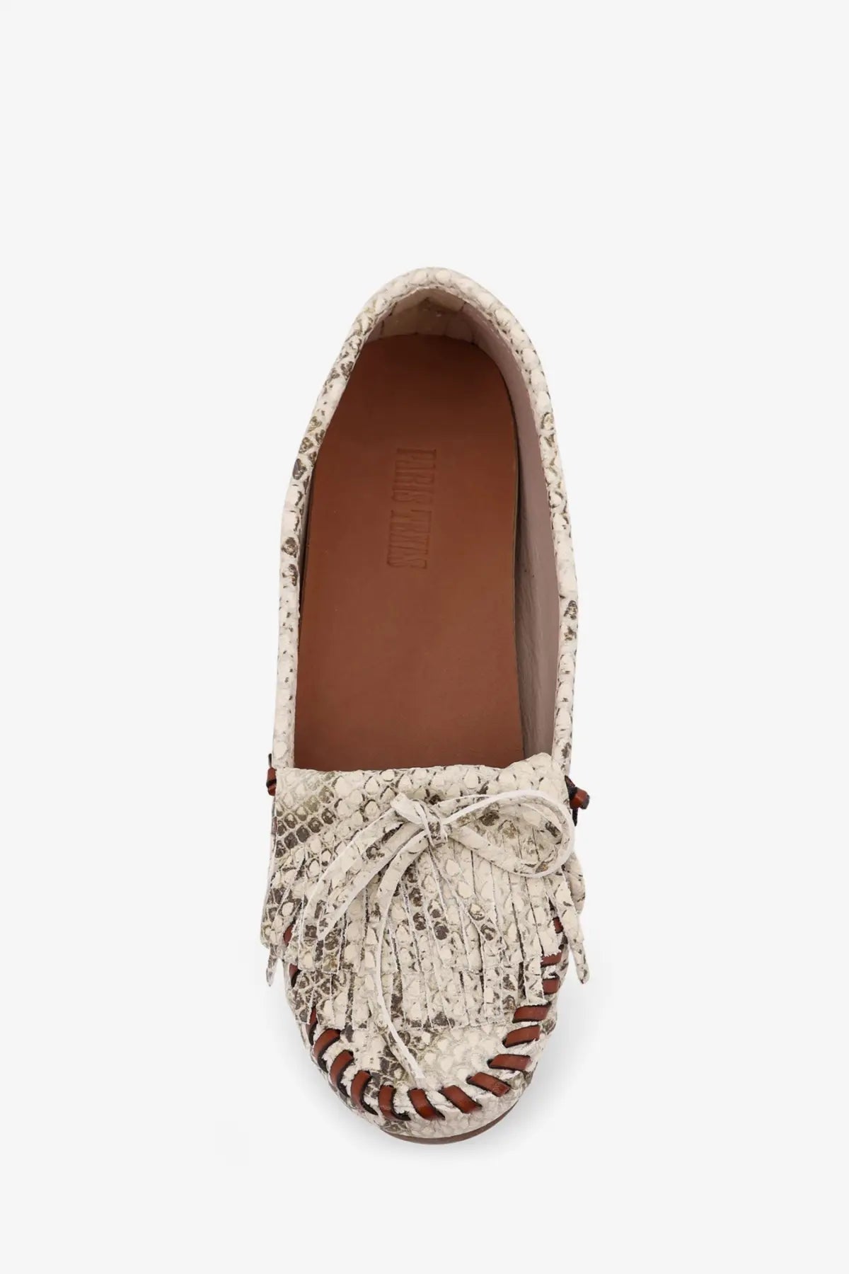 Cream-colored snake-print womens leather moccasin with brown leather accents and fringe detailing by Paris Texas