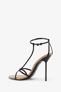 Paris Texas women’s Lidia black patent leather strappy high heel sandal with cork insole and sole front view