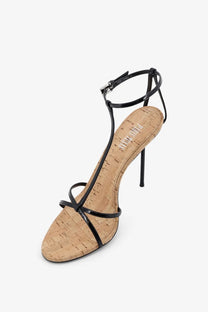 Paris texas women’s lidia black patent leather strappy high heel sandal with cork insole and slender stiletto heel
